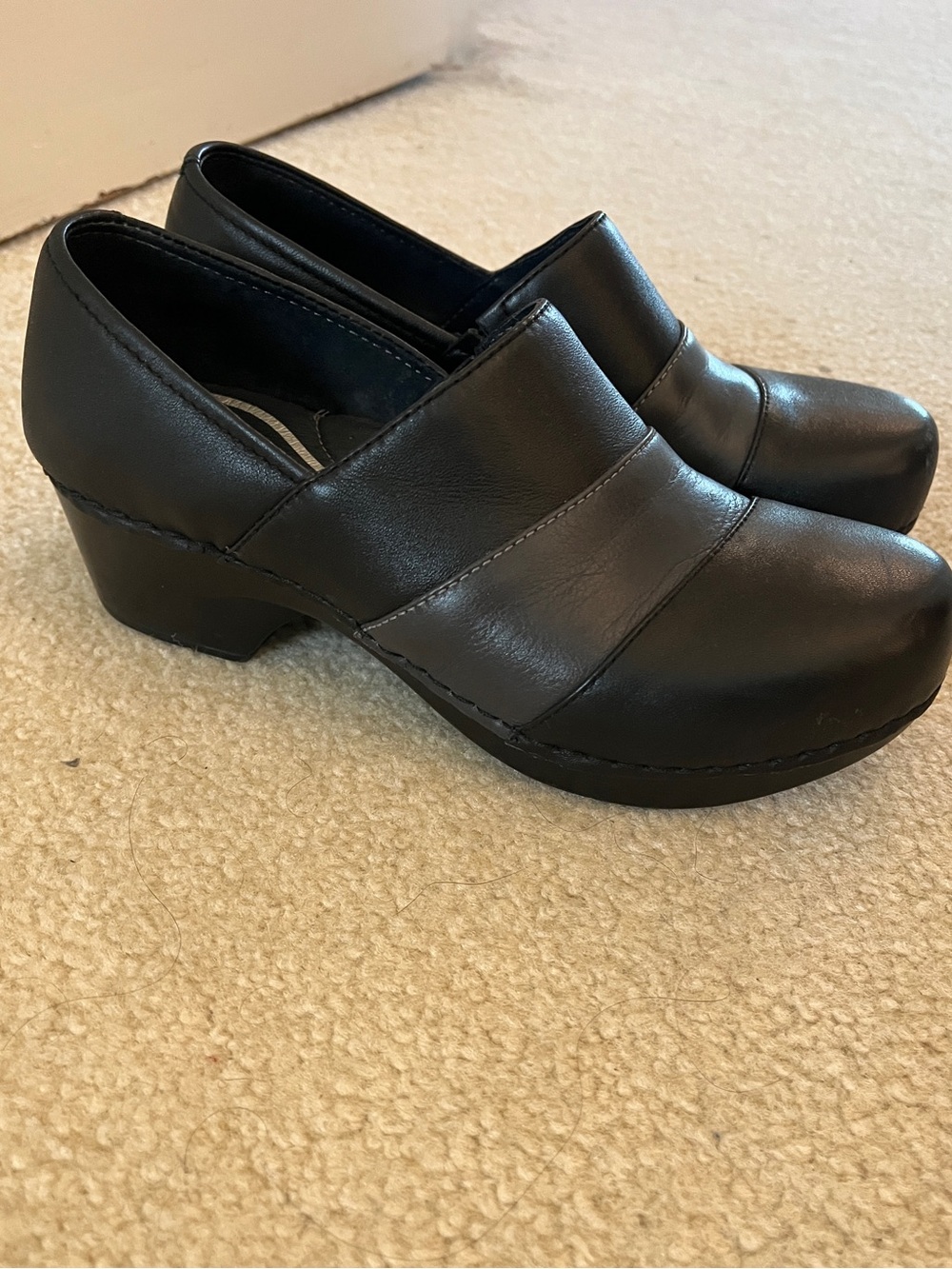 Dansko Black Leather Slip-On Clogs